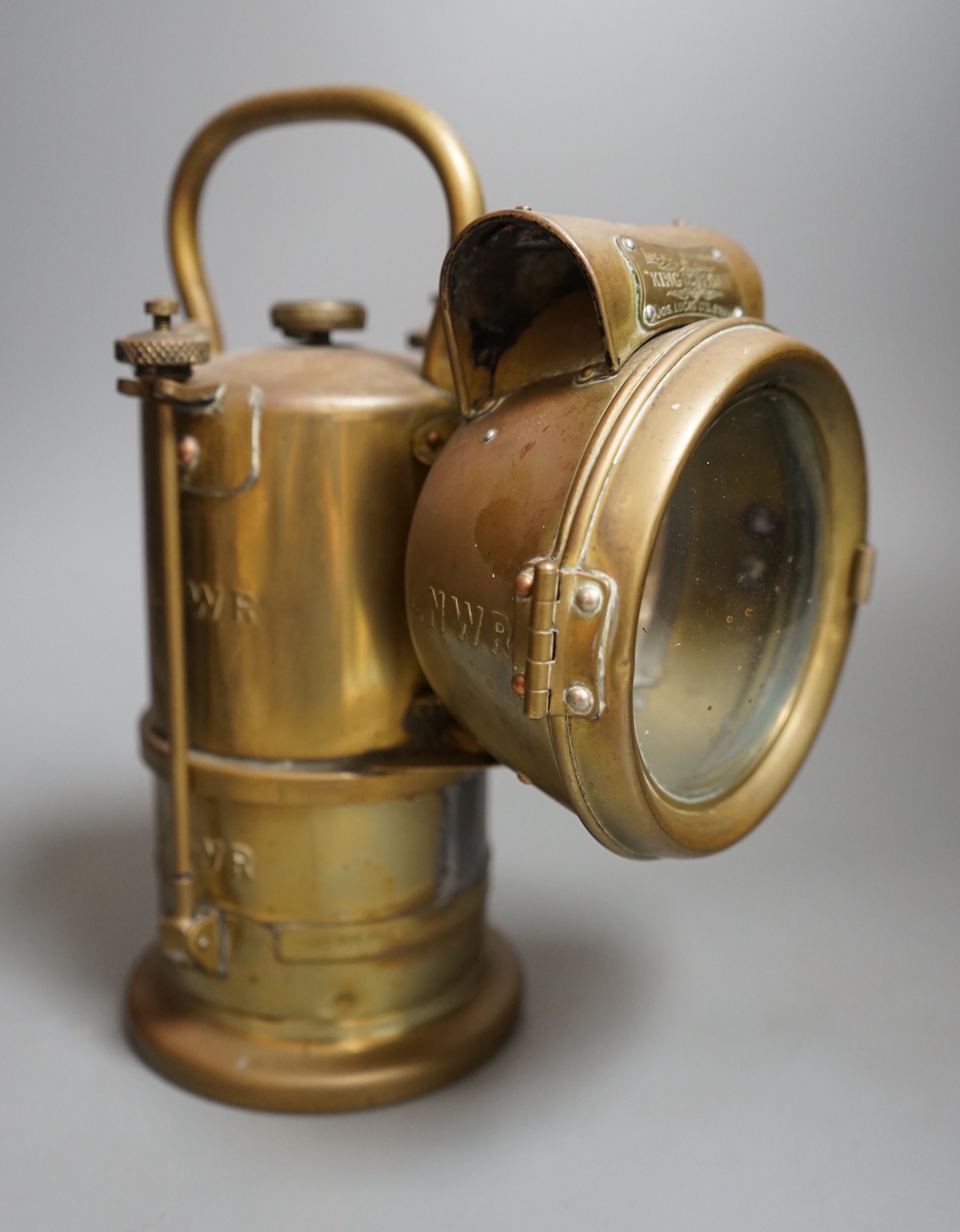 A LNWR railway inspection lamp, company ceased trading in 1922, 26cms high